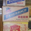 Three Fauerbach returnable beer bottle boxes.